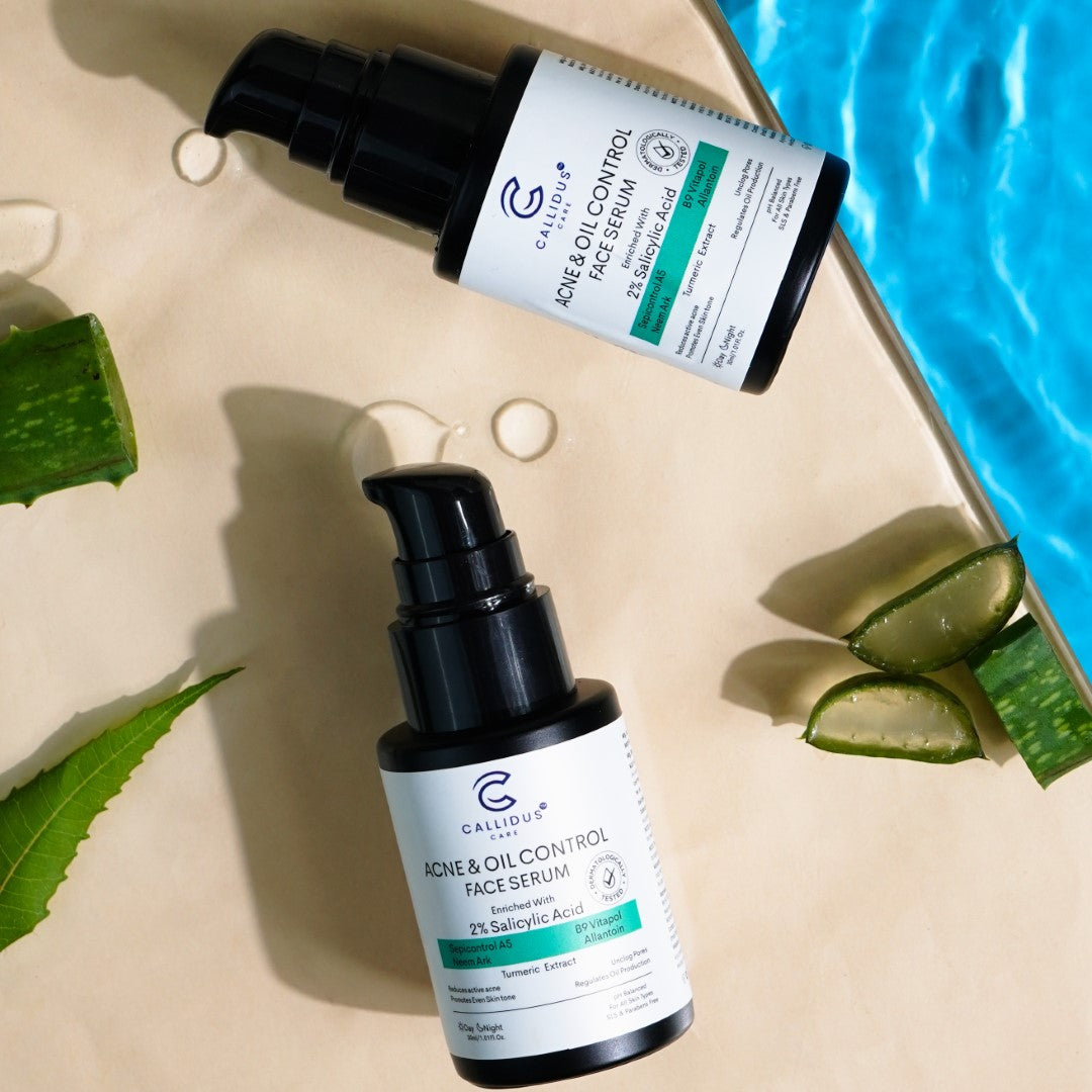 Flatlay of Callidus Acne & Oil Control Face Serum with aloe vera and water background
