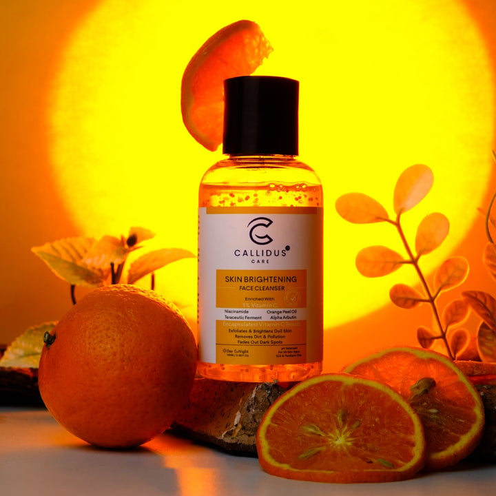 Vitamin C Skin Brightening Cleanser with fresh oranges and sun illustration symbolizing natural glow and antioxidant protection